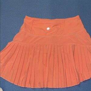 Baleaf Pleated Orange Women's sport Skirt with shorts size S